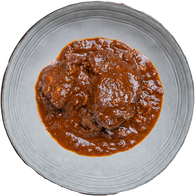 Guancia di suino al vino rosso on its original plate