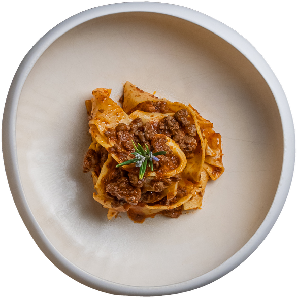 Pappardelle al cinghiale on its original plate